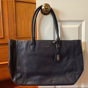 Excellent condition Cole Haan purse. Navy blue leather.